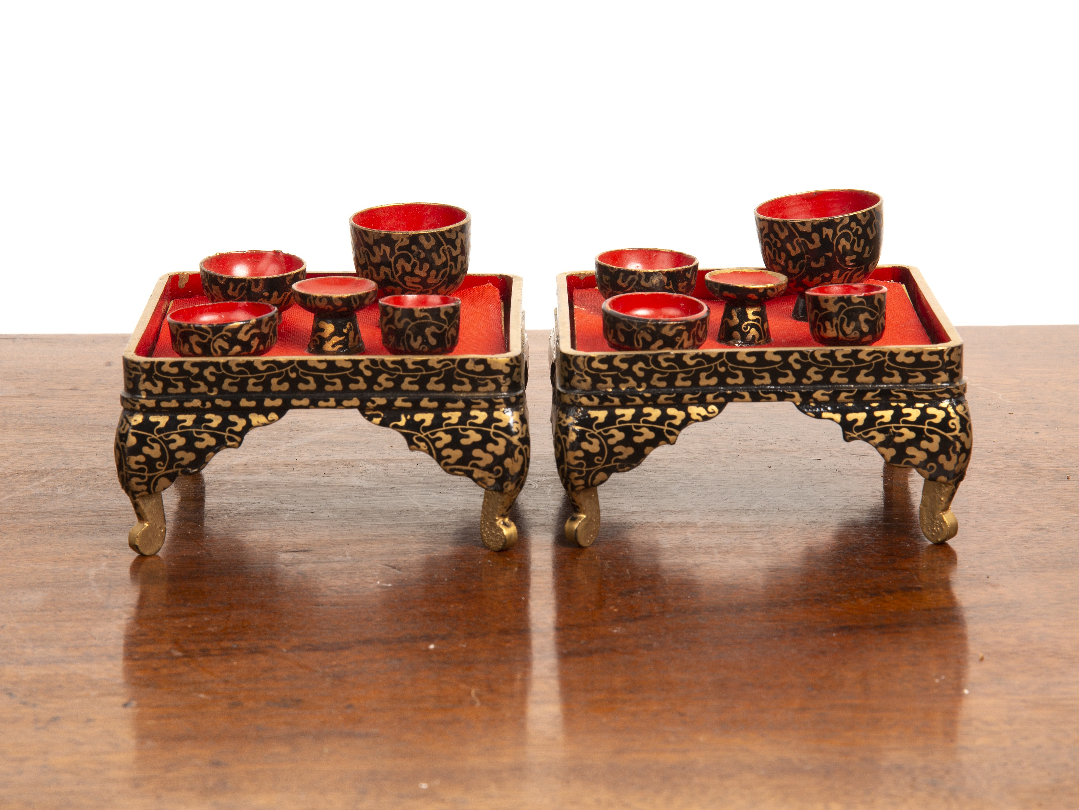 Appraisal: Two Japanese Hina dolls house painted tea sets on stands