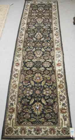 Appraisal: HAND KNOTTED ORIENTAL RUNNER Indo-Persian overall floral Kashan design on