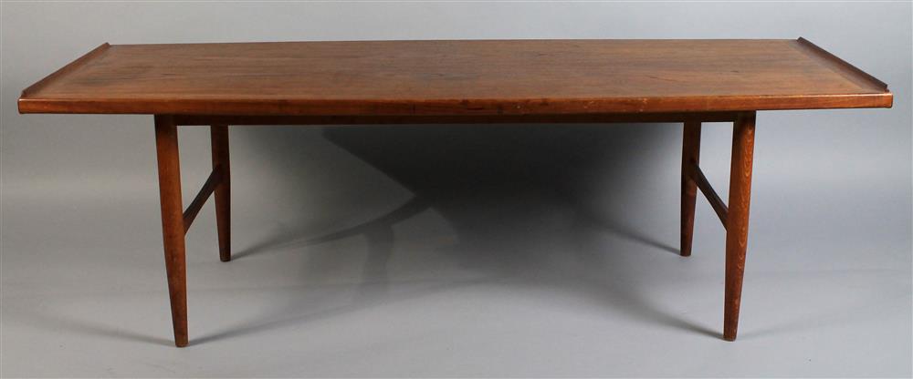 Appraisal: MILLS DENMARK TEAK RECTANGULAR COFFEE TABLE with raised lip design