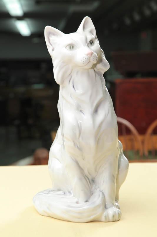 Appraisal: ROYAL DUX CAT Seated cat in white porcelain Stamped signature