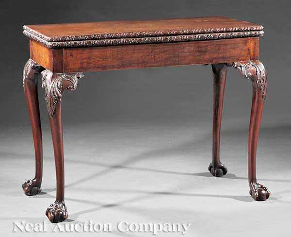 Appraisal: A Georgian Carved Mahogany Games Table c rectangular foldover top