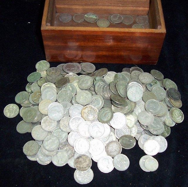 Appraisal: An inlaid box containing a quantity of sixpence pieces