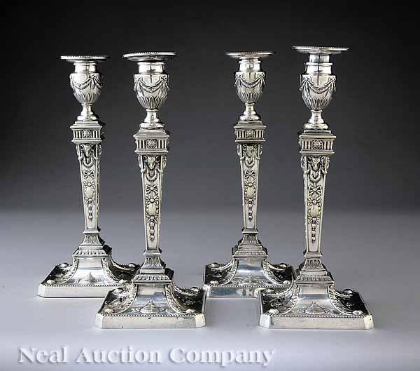 Appraisal: A Set of Four Antique English Silverplate Candlesticks in the