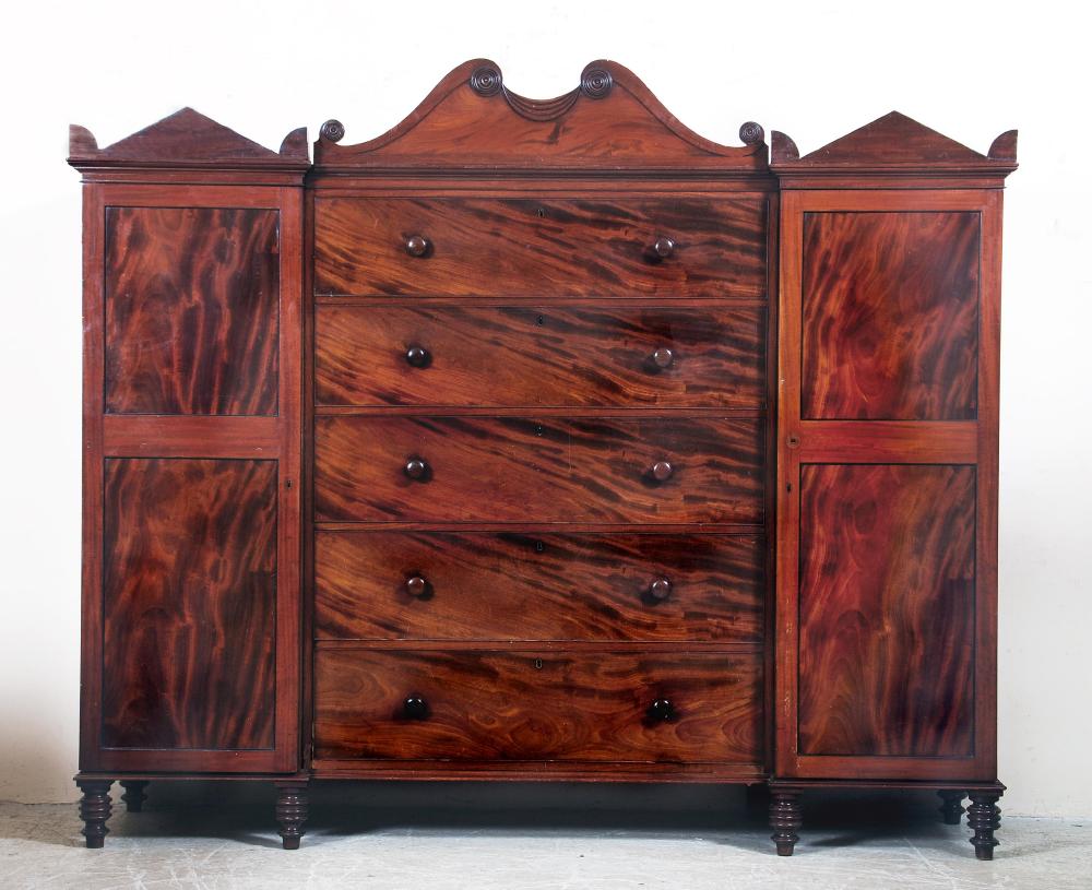 Appraisal: A GENTLEMAN'S REGENCY MAHOGANY COMPACTUM the central section with five