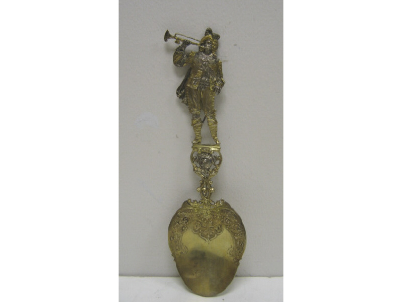 Appraisal: GERMAN GILT SILVER FIGURAL SPOON Shaped flat bowl with rococo