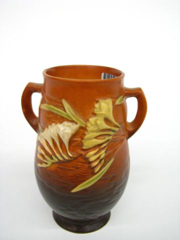 Appraisal: Roseville Pottery Freesia brown vase - no noticed chips or