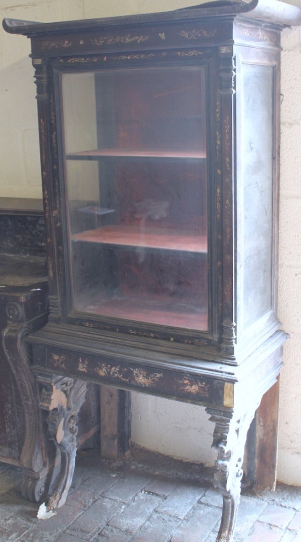 Appraisal: A thC Peret of Paris display cabinet on stand with