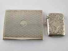 Appraisal: A Continental white metal tests silver card case with engine