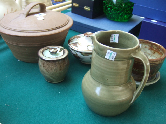 Appraisal: A quantity of studio pottery including a buff ground lidded