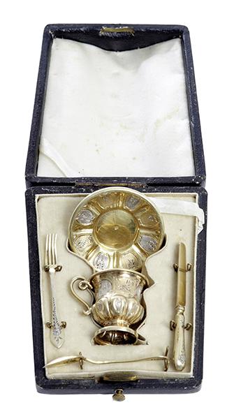 Appraisal: A BOXED FRENCH MINIATURE SILVER PLACE SETTING comprising fork knife