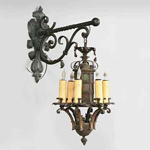 Appraisal: An Aesthetic Revival Wrought Iron Stained Glass Bracket Lantern circa