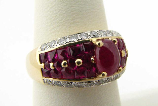 Appraisal: k yellow gold ruby diamond LeVian ring Center cabachon oval