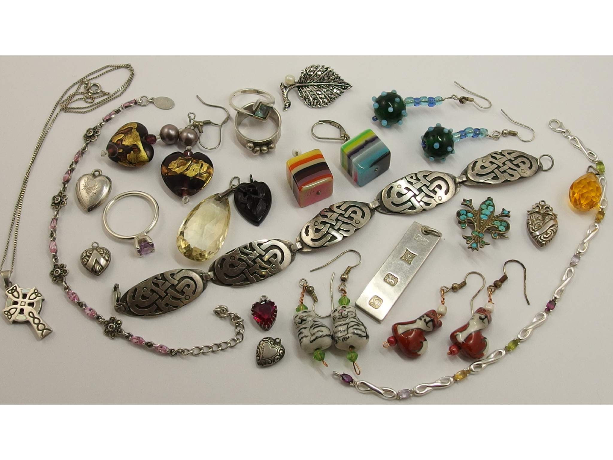 Appraisal: A collection of silver and costume jewellery to include a