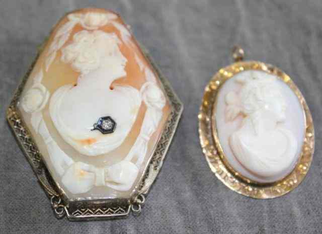 Appraisal: Cameo Pendant-Brooches Set with Old EuropeanCut Diamonds of carats Larger