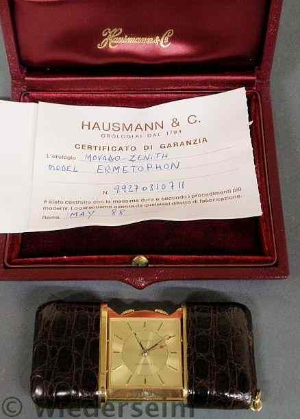 Appraisal: Swiss made Hausmann Co travel clock watch with a reptile