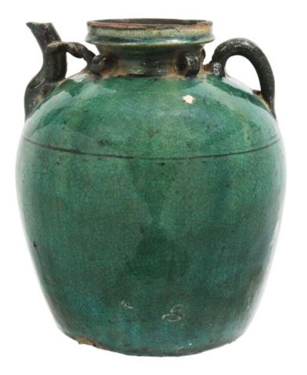 Appraisal: Large Chinese green glazed earthenware wine ewer having applied loops