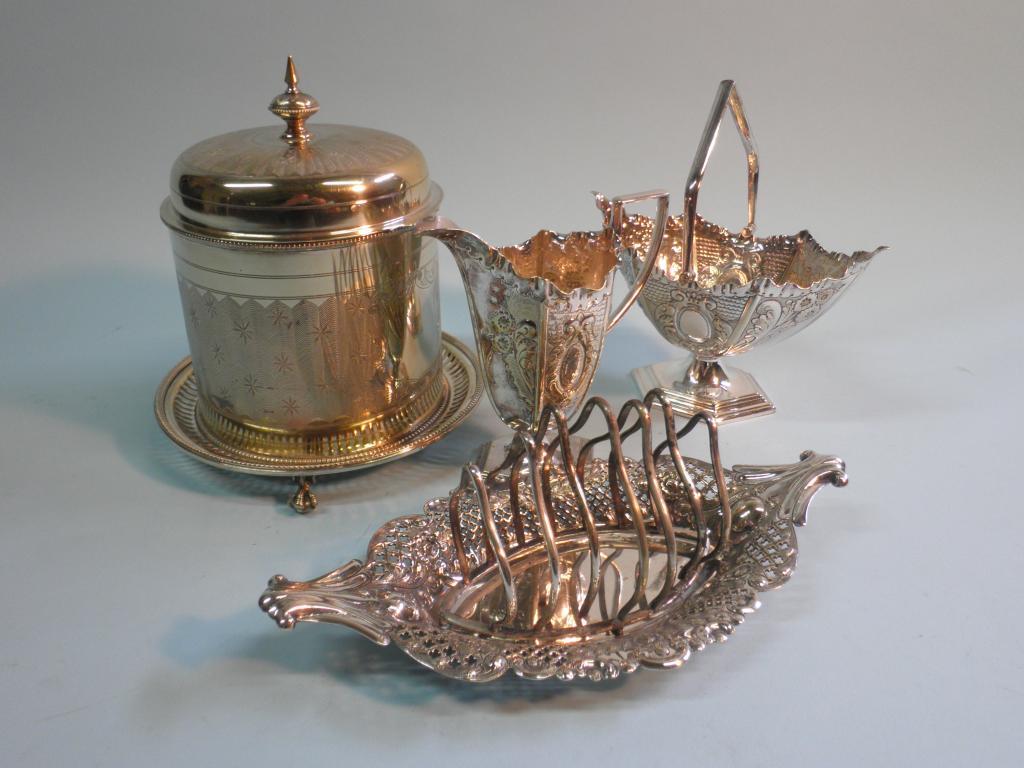 Appraisal: A Victorian silver plated six division toast rack an engraved