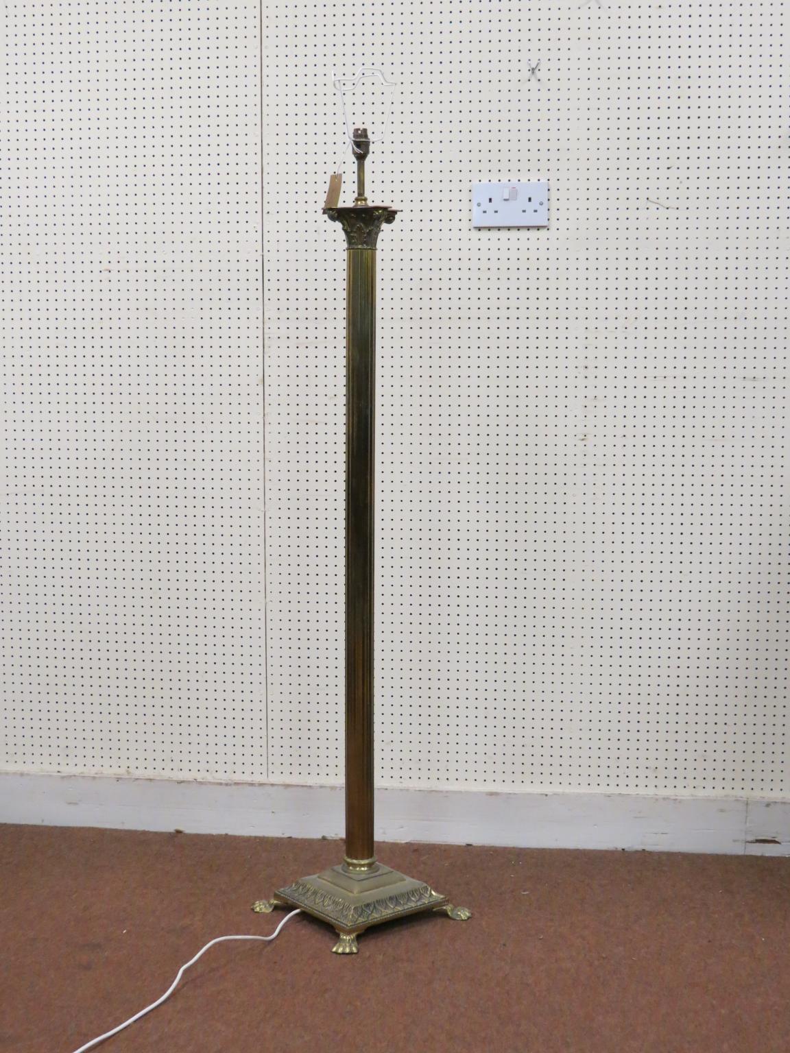 Appraisal: An early th century brass floor lamp with Corinthian capital