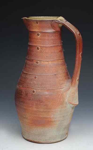 Appraisal: Phil Rogers British b A medieval style stoneware jug with