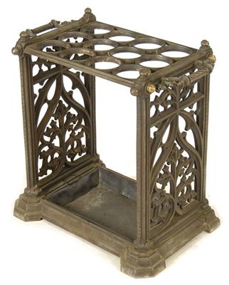 Appraisal: A cast iron stickstand for twelve canes the side handles