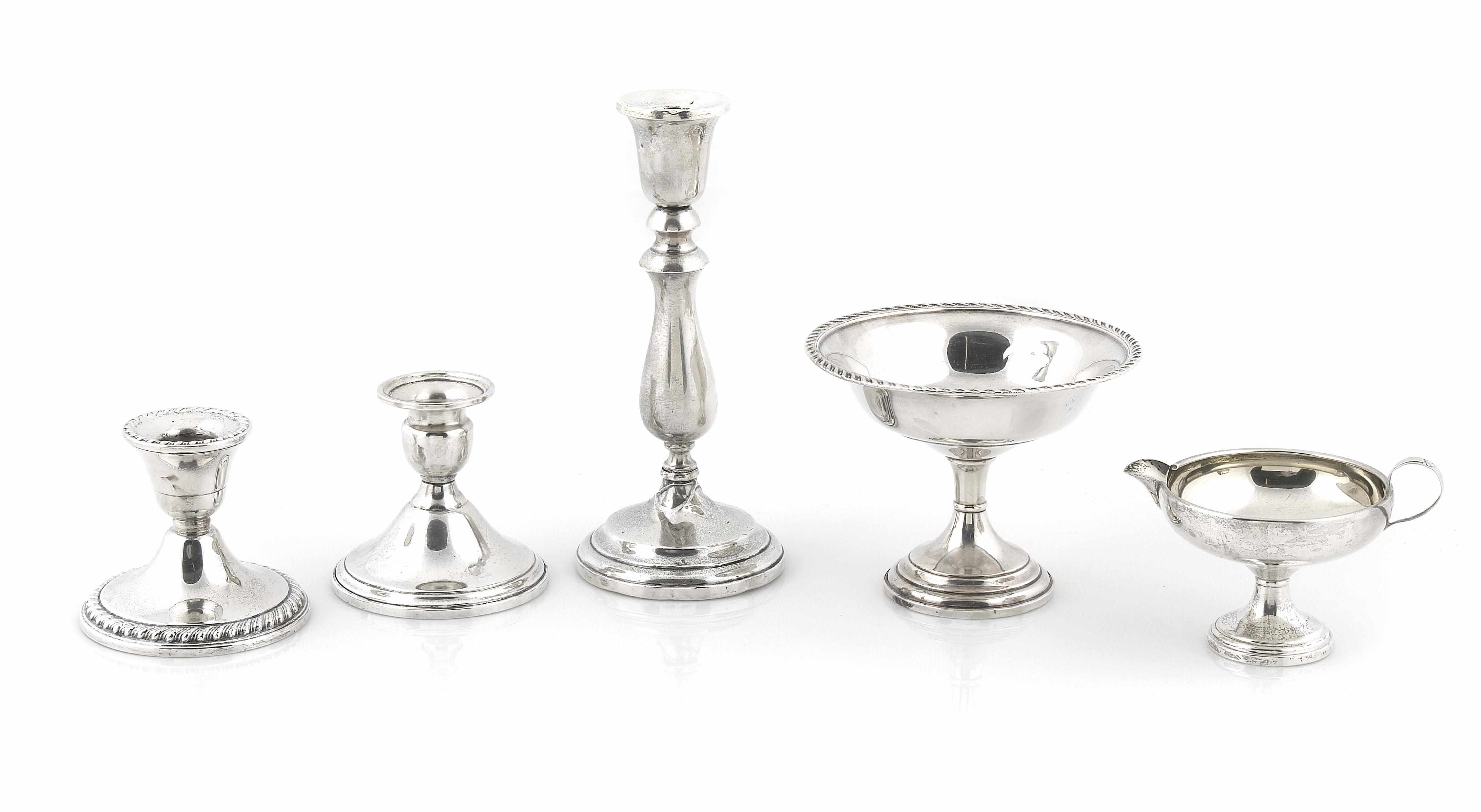 Appraisal: An assembled group of American weighted sterling silver hollowware th