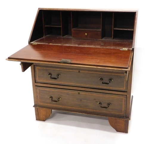 Appraisal: An Edwardian mahogany and satinwood cross banded bureau the fall