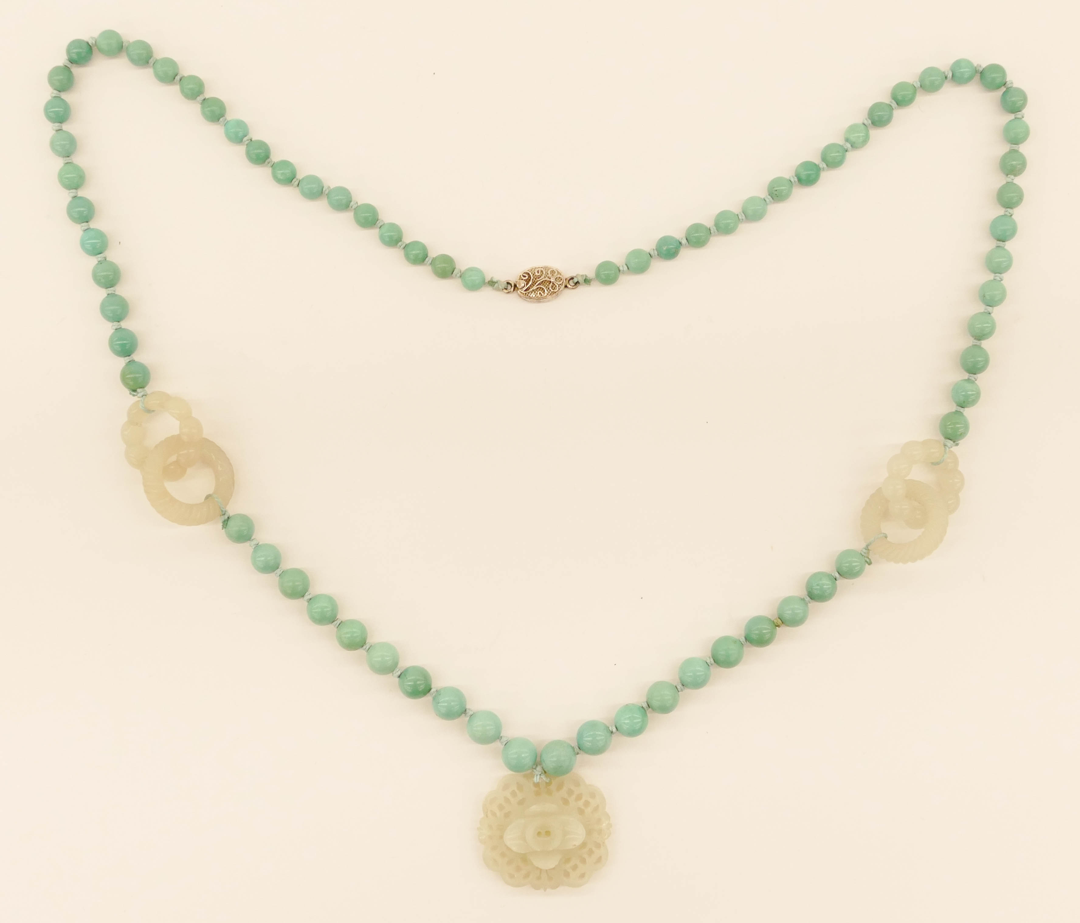 Appraisal: Chinese Turquoise Jade Toggle Necklace '' A natural coral bead