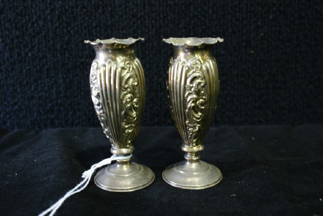 Appraisal: A pair of sterling silver embossed posy vases Birmingham maker