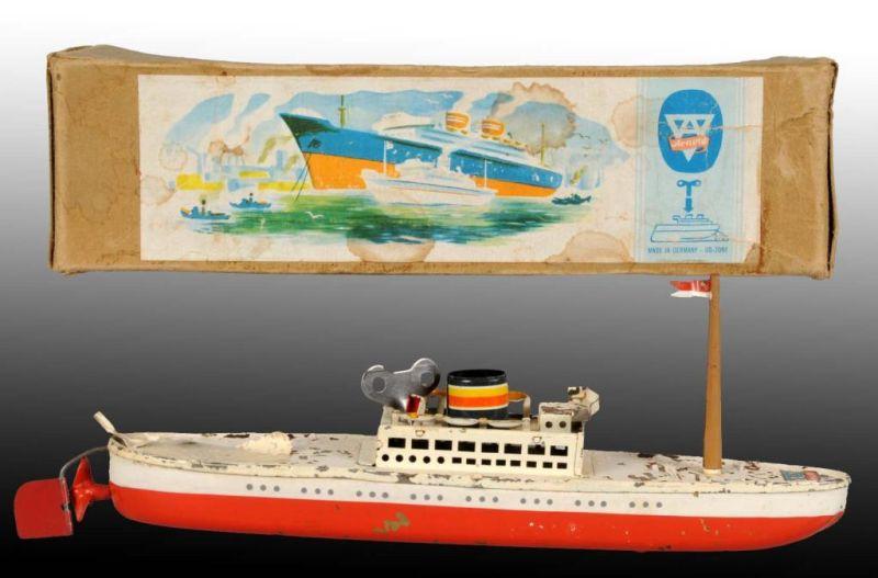 Appraisal: Tin Arnold Boat Wind-Up Toy Description German Includes original box