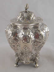 Appraisal: A late Victorian embossed lobed silver tea caddy on four