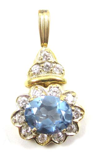 Appraisal: SYNTHETIC BLUE SPINEL AND DIAMOND PENDANT set with round-cut diamonds