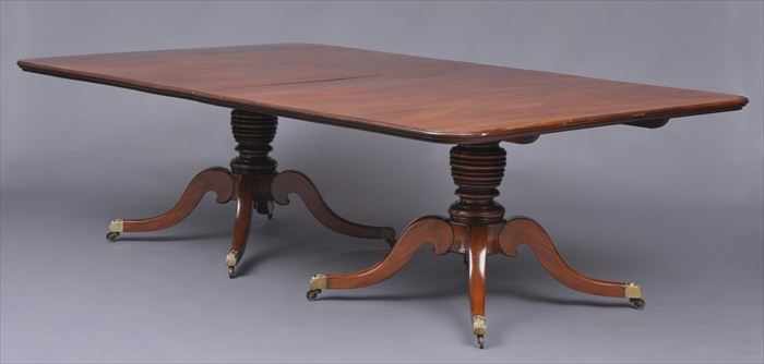 Appraisal: GEORGE IV CARVED MAHOGANY TWO-PEDESTAL DINING TABLE The top with