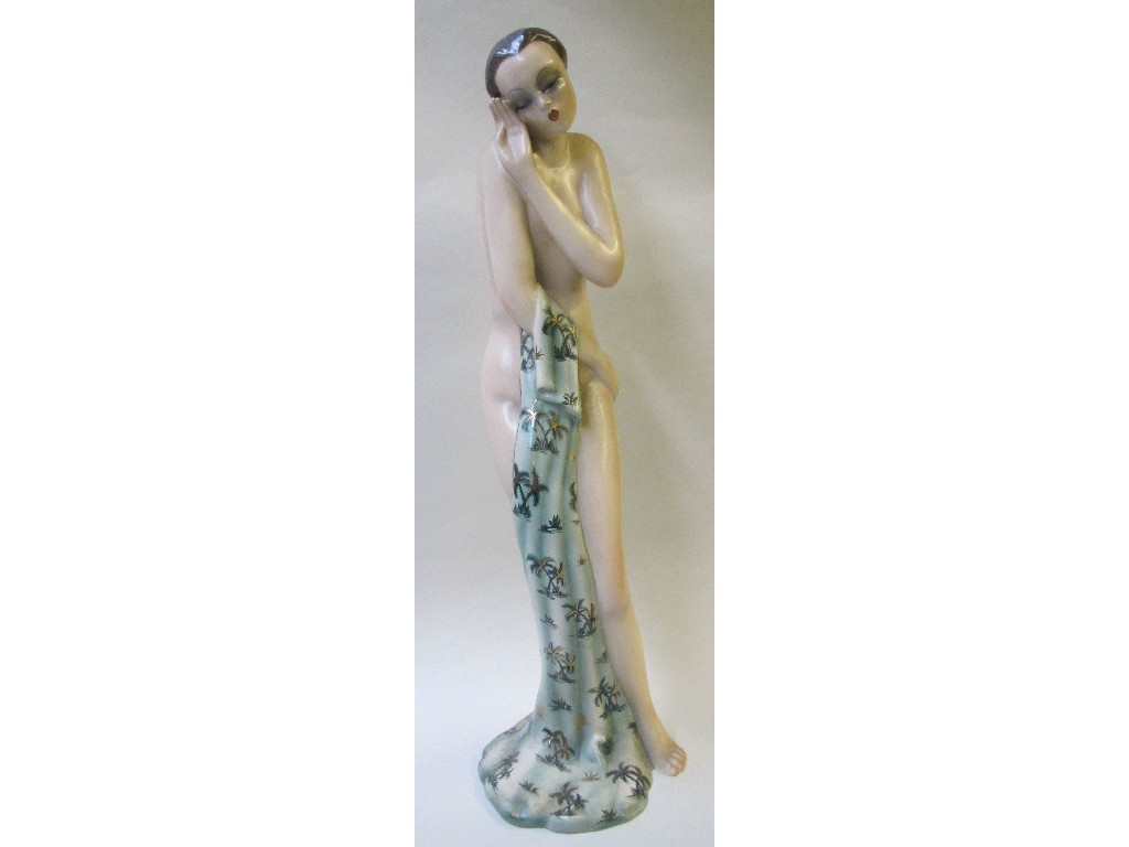 Appraisal: An Igni Torino porcelain female figure holding a loosely draped