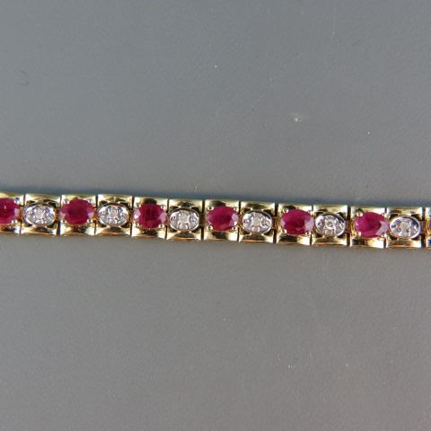 Appraisal: Ruby Diamond Bracelet oval rubies totaling carats and diamonds totaling