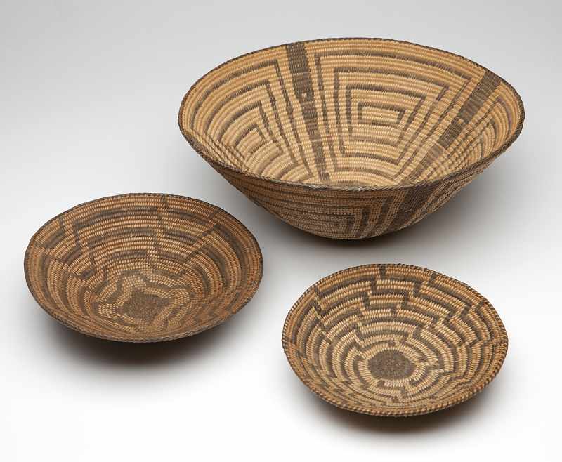 Appraisal: One tray and two bowls each with geometric motifs the