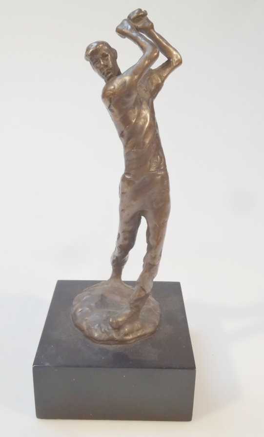 Appraisal: A spelter figure of a standing golfer on a naturalistic