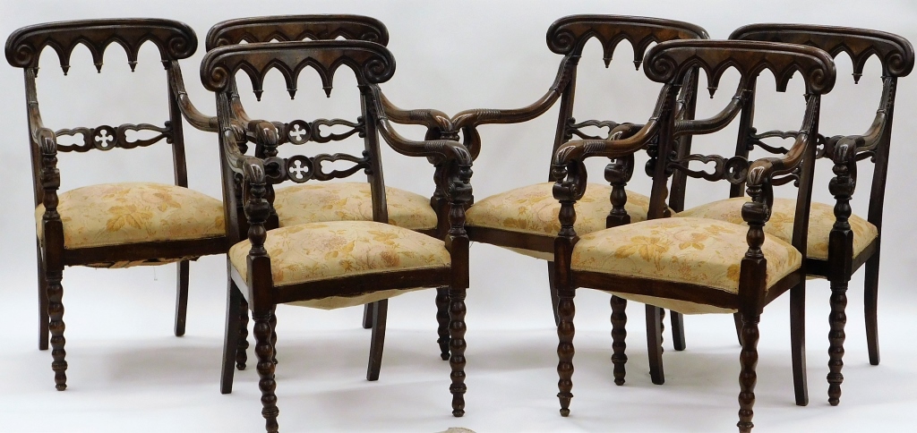 Appraisal: ENGLISH VICTORIAN CARVED WOOD ARM CHAIRS England Late th CenturyFinely