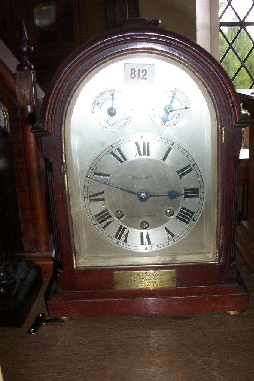 Appraisal: A mahogany bracket clock in a Georgian style with arched