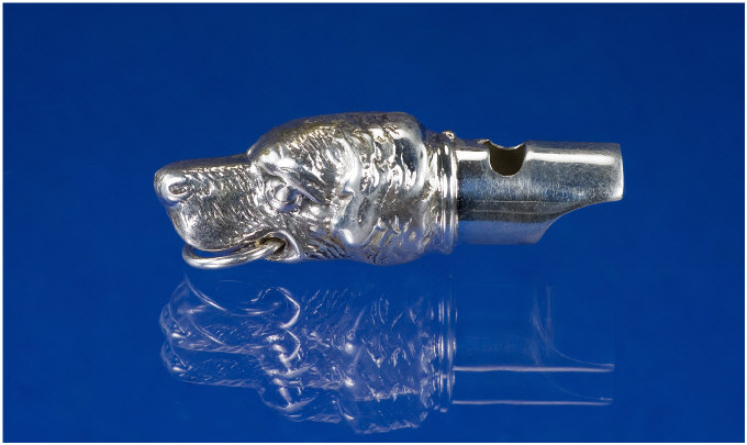 Appraisal: Silver Whistle The Body Formed As A Dogs Head Stamped