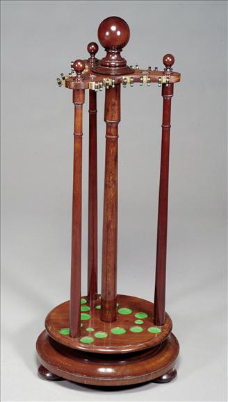 Appraisal: A Victorian mahogany revolving billiard cue stand circa with turned