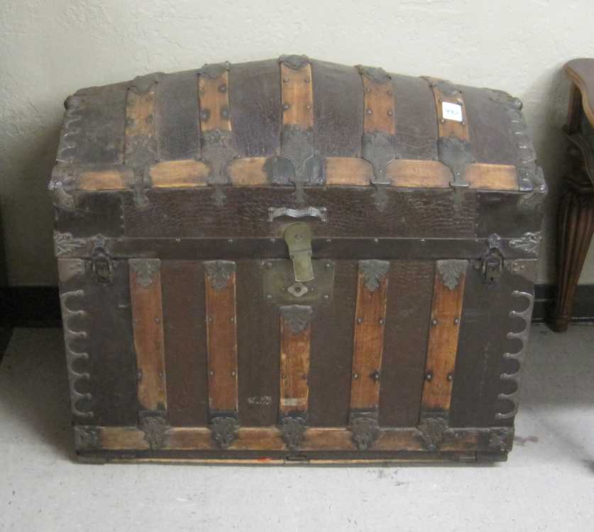 Appraisal: ANTIQUE DOME-TOP 'SARATOGA' STEAMER TRUNK American c s a large