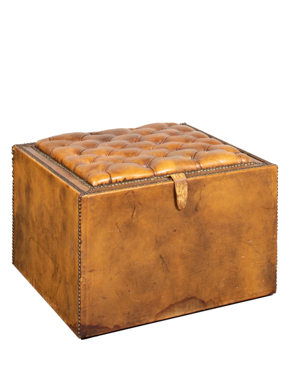 Appraisal: TAN CHESTERFIELD TUFTED LEATHER STORAGE OTTOMAN Tufted tan leather Chesterfield