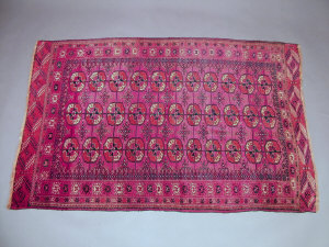 Appraisal: A Bokhara rug with three rows of guls in a