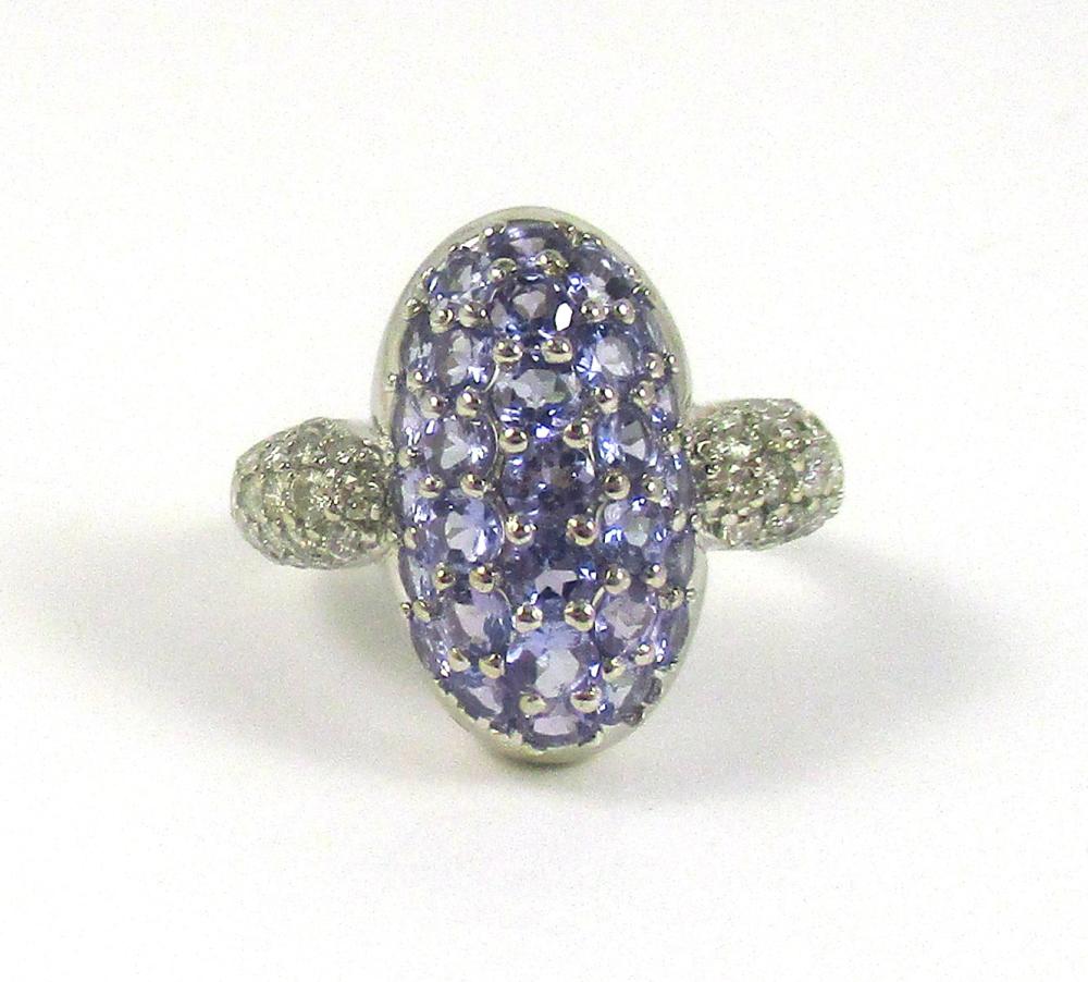 Appraisal: TANZANITE DIAMOND AND FOURTEEN KARAT WHITE GOLD RING with an