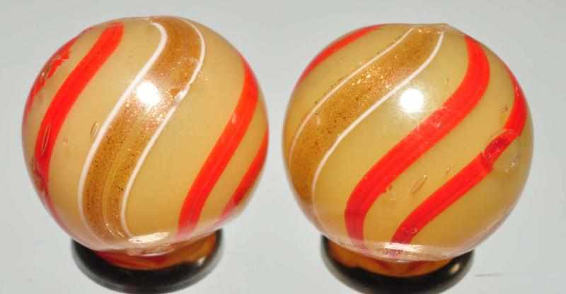 Appraisal: Lot of Butterscotch Banded Lutz Marbles Description Same cane Semitransparent