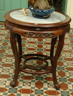 Appraisal: A CHINESE ROSEWOOD CENTRE TABLE Circular with a marble inset