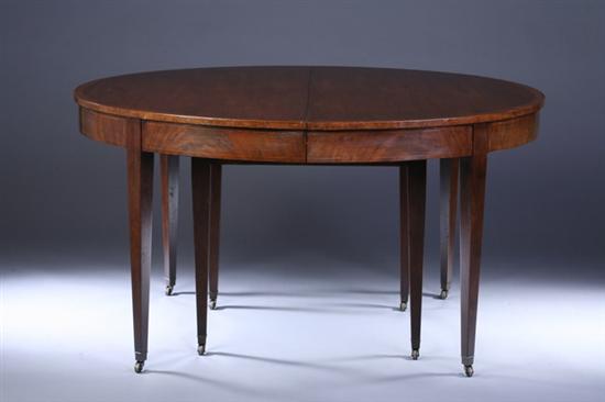 Appraisal: GEORGE III STYLE INLAID MAHOGANY DINING TABLE th century Baker