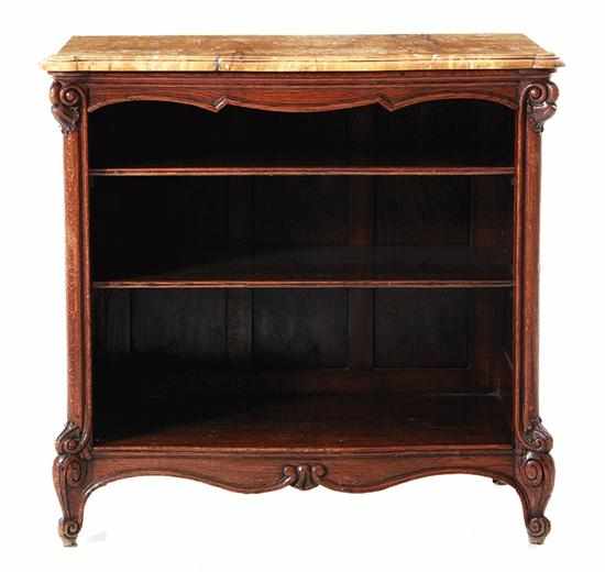 Appraisal: French Provincial carved oak marbletop bookcase th century bowfront top