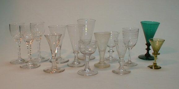 Appraisal: A collection of drinking glasses various styles colours and ages