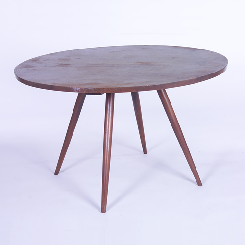 Appraisal: GEORGE NAKASHIMA Walnut dining table with circular top on four